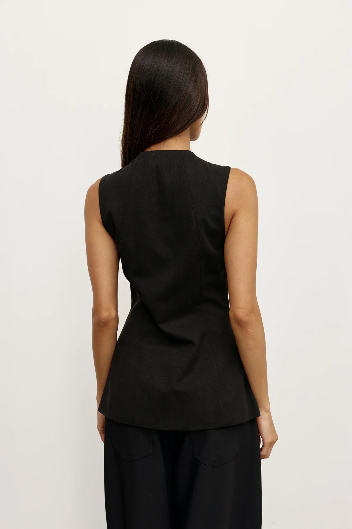 Bayse Rowe Top Black - full length view styled with wide-leg tailored trousers