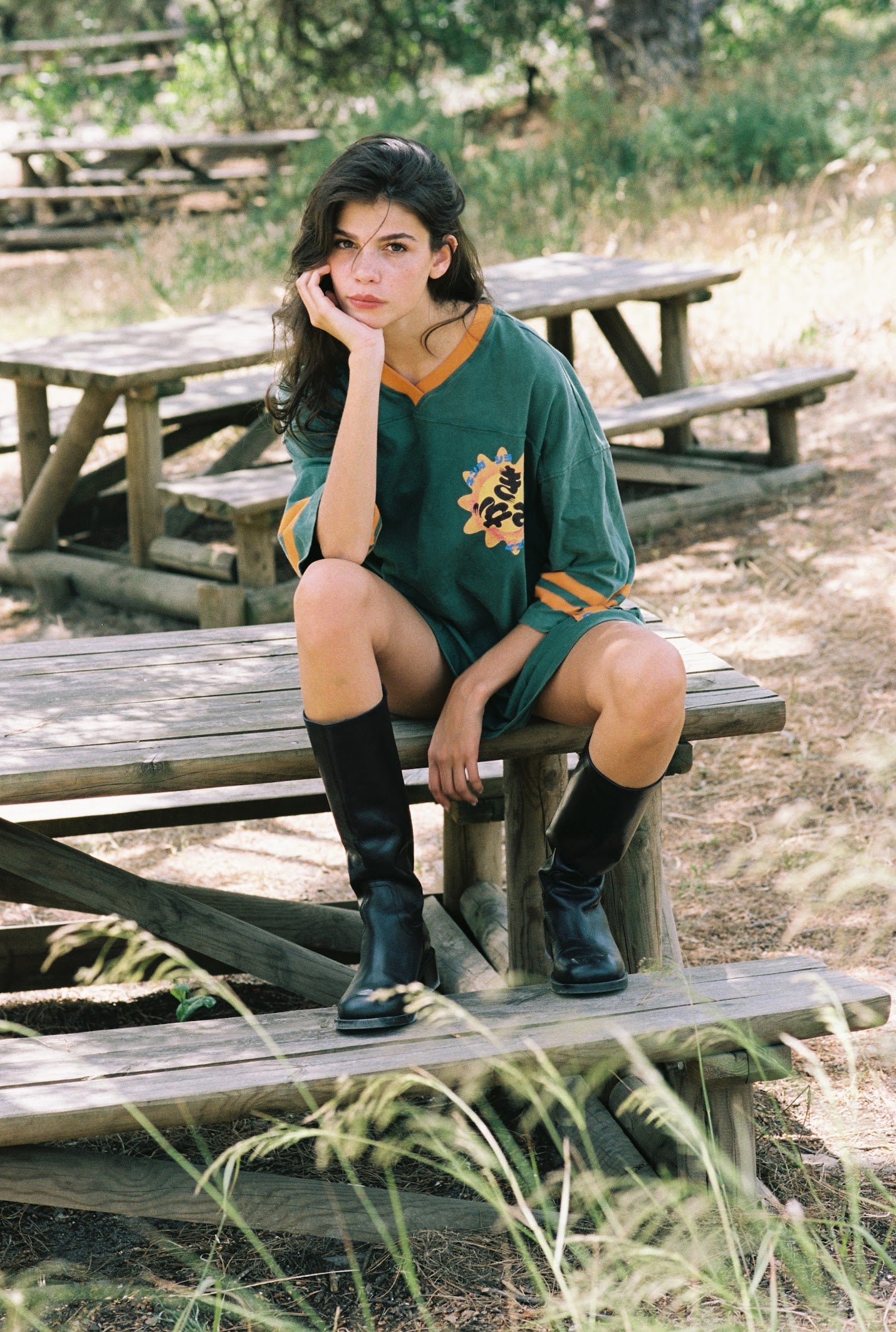 Kinga Csilla 77 Sun Team Tee Dress in forest green — close-up of '77' number and hand-drawn sun graphic detail by Izumi Hooper of Studio Zube