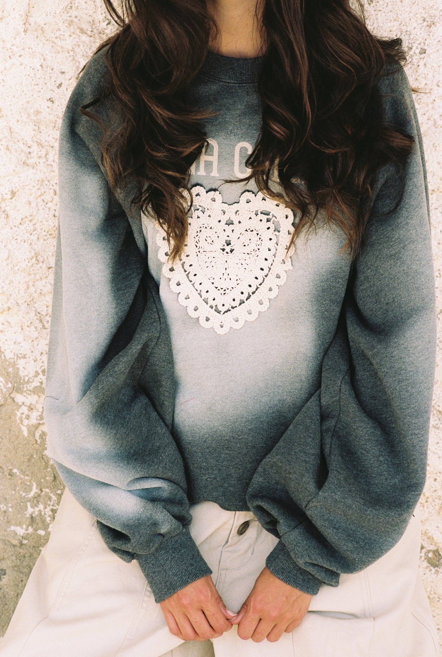 Kinga Csilla Day Hearts Med Jumper in washed teal — ribbed crew neck, dropped-shoulder silhouette and sleeve crest patch