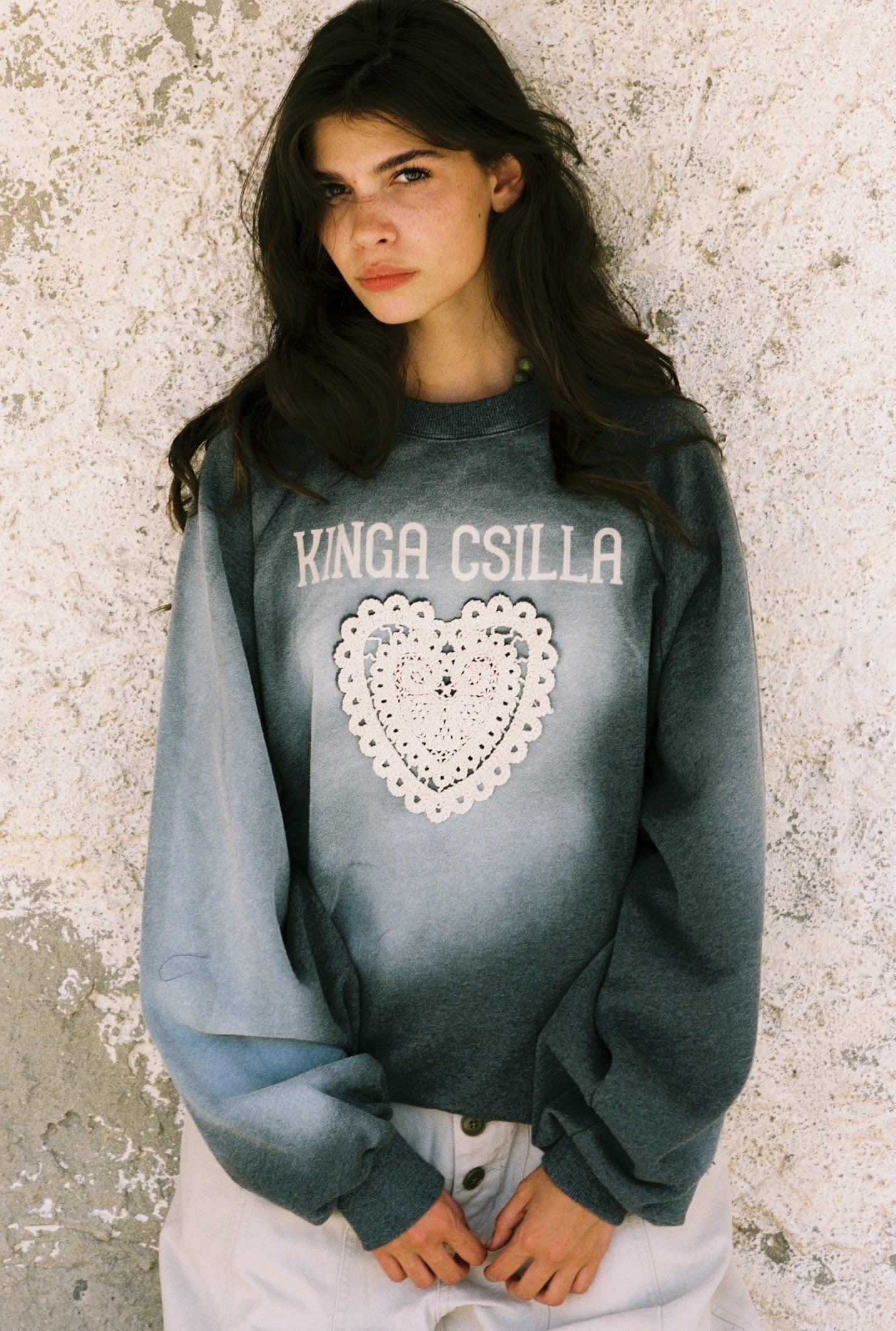 Kinga Csilla Day Hearts Med Jumper in washed teal — campaign image from the Domenica Collection