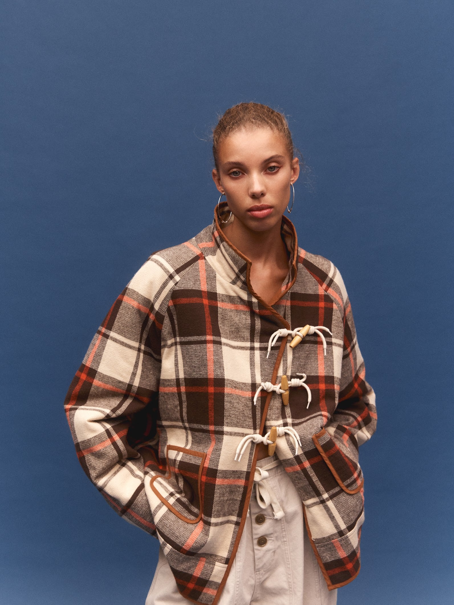 Kinga Csilla Rally Quilted Cocoon Jacket in tartan check — back view showing oversized cocoon shape and check pattern