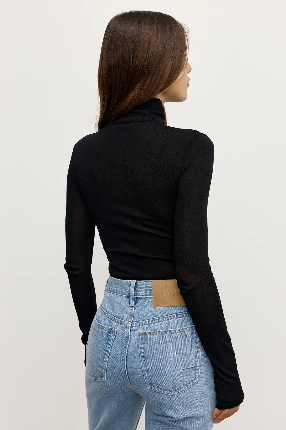 Bayse Airlie Top Black - full length view styled with wide-leg trousers