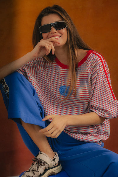 Ciao Ciao Vacation Rays Racer Tee - front view, multi-colour stripe with red crew neck and Ciao oval badge