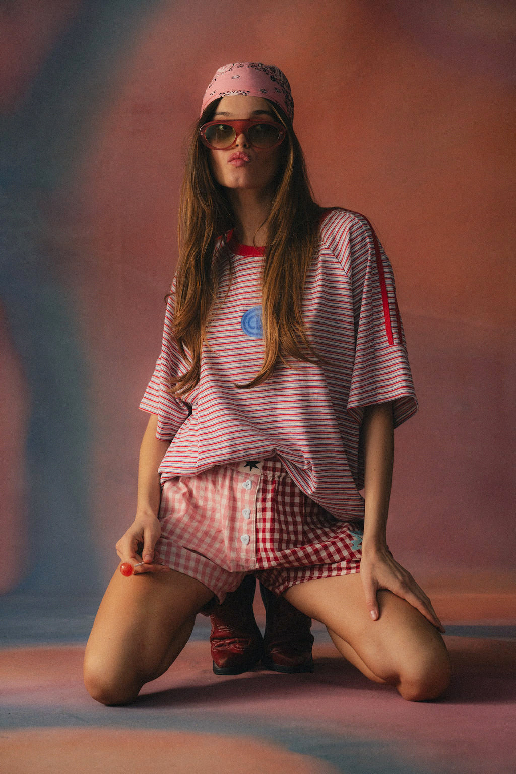 Ciao Ciao Vacation Rays Racer Tee - action campaign shot in red stripe with cobalt blue trousers