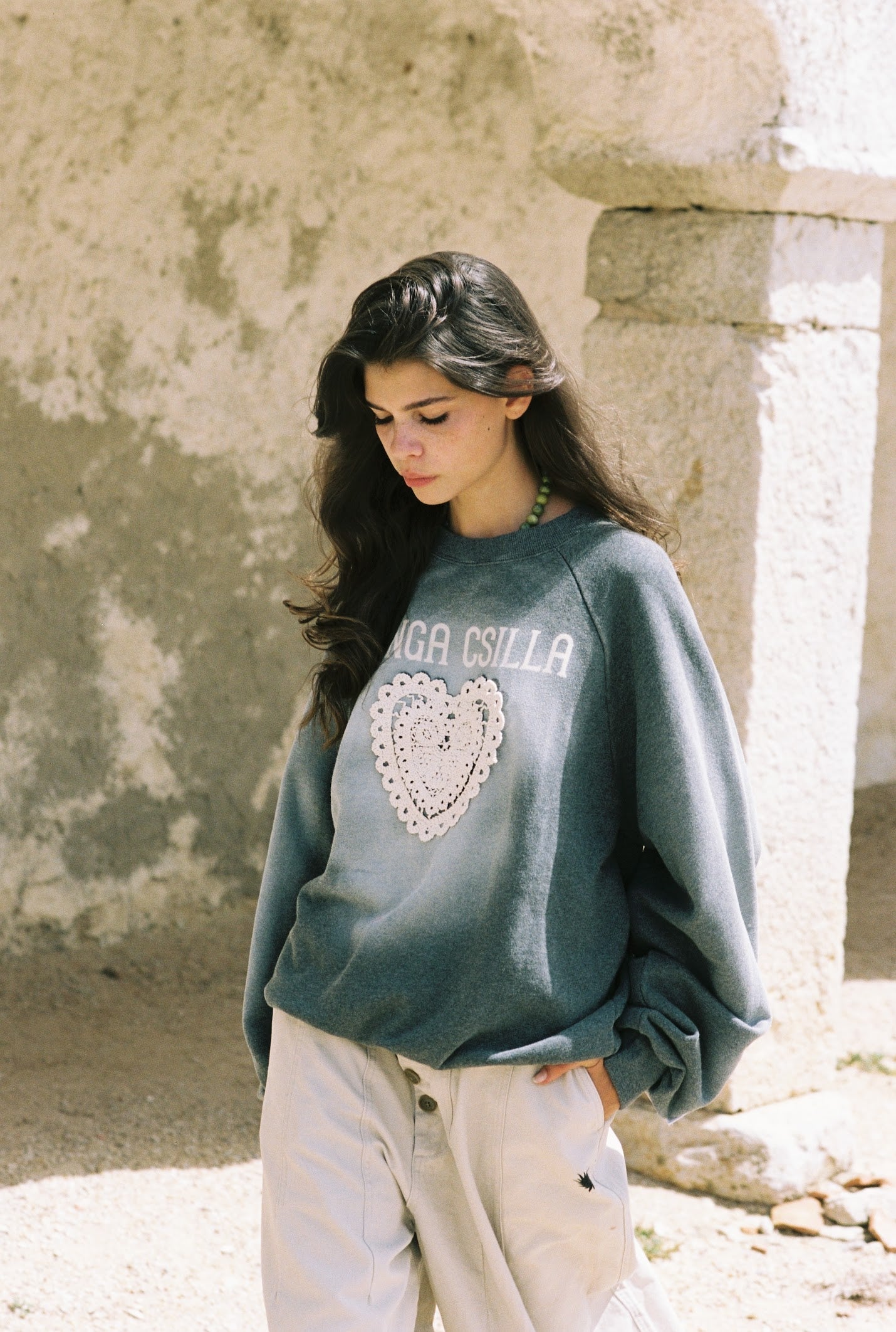 Kinga Csilla Day Hearts Med Jumper in washed teal — oversized sweatshirt with crochet lace heart motif and Kinga Csilla chest print