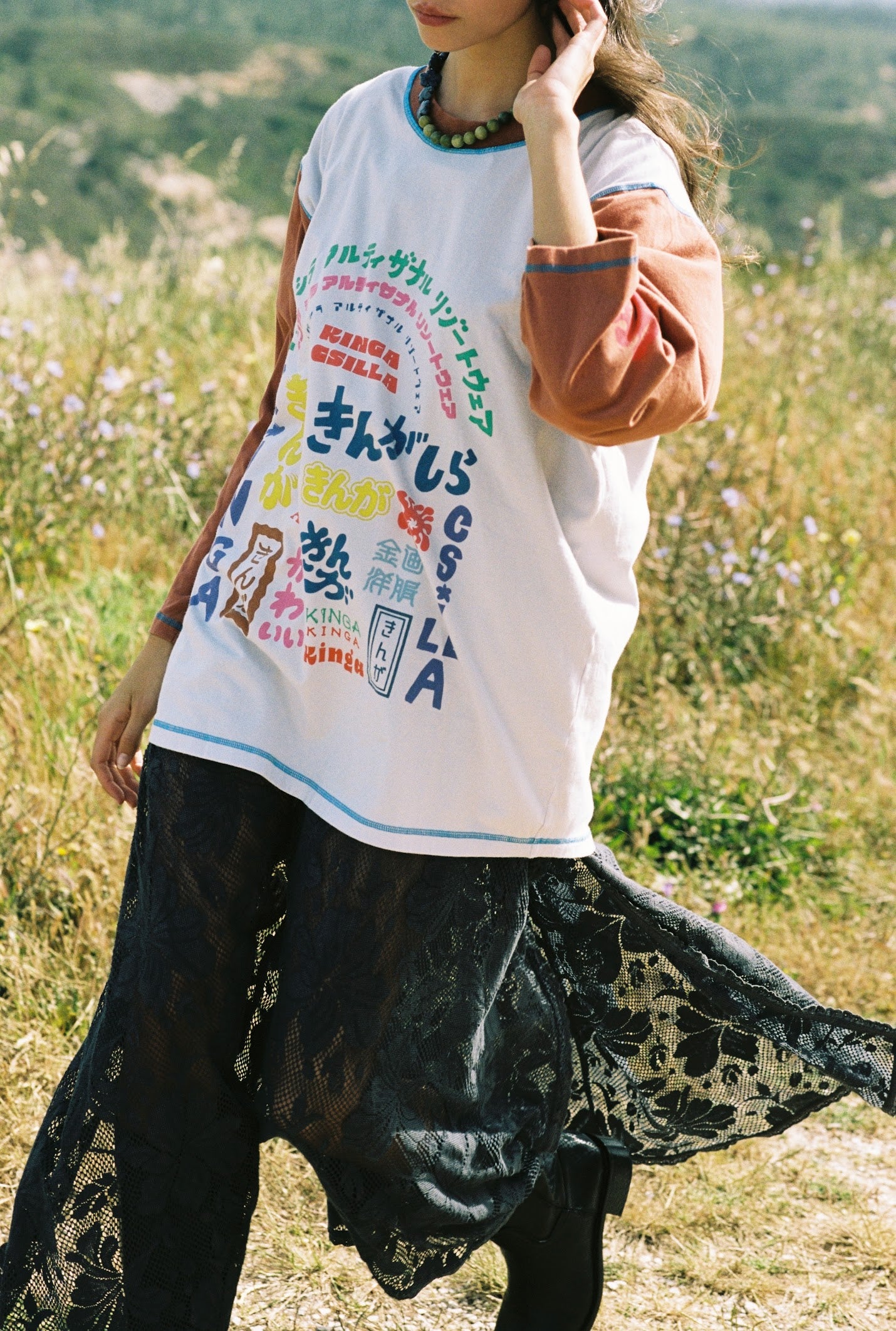 Kinga Csilla Japanese Sunset Tommy Tee in white — styled over Midnight Lace Notte Skirt, Domenica Collection