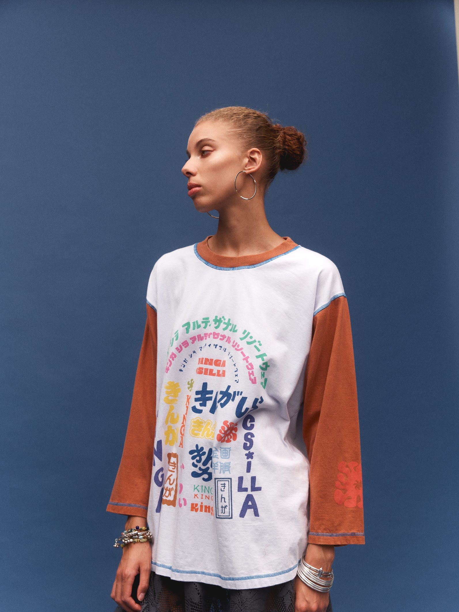Kinga Csilla Japanese Sunset Tommy Tee in white — oversized raglan tee with illustrated art, worn relaxed