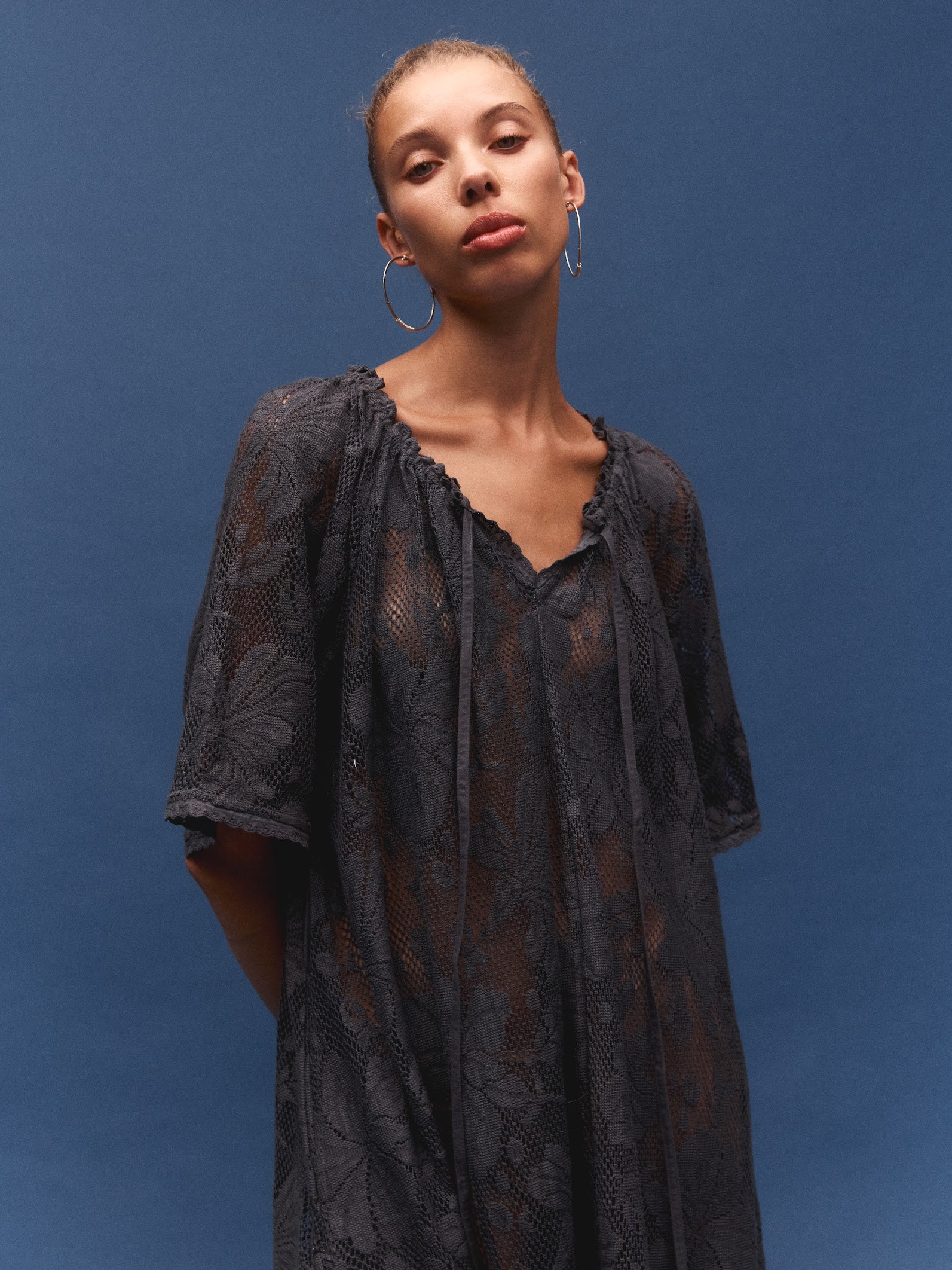 Kinga Csilla Midnight Lace Primavera Maxi Dress in midnight — full-length campaign shot showing fluid movement of lace maxi