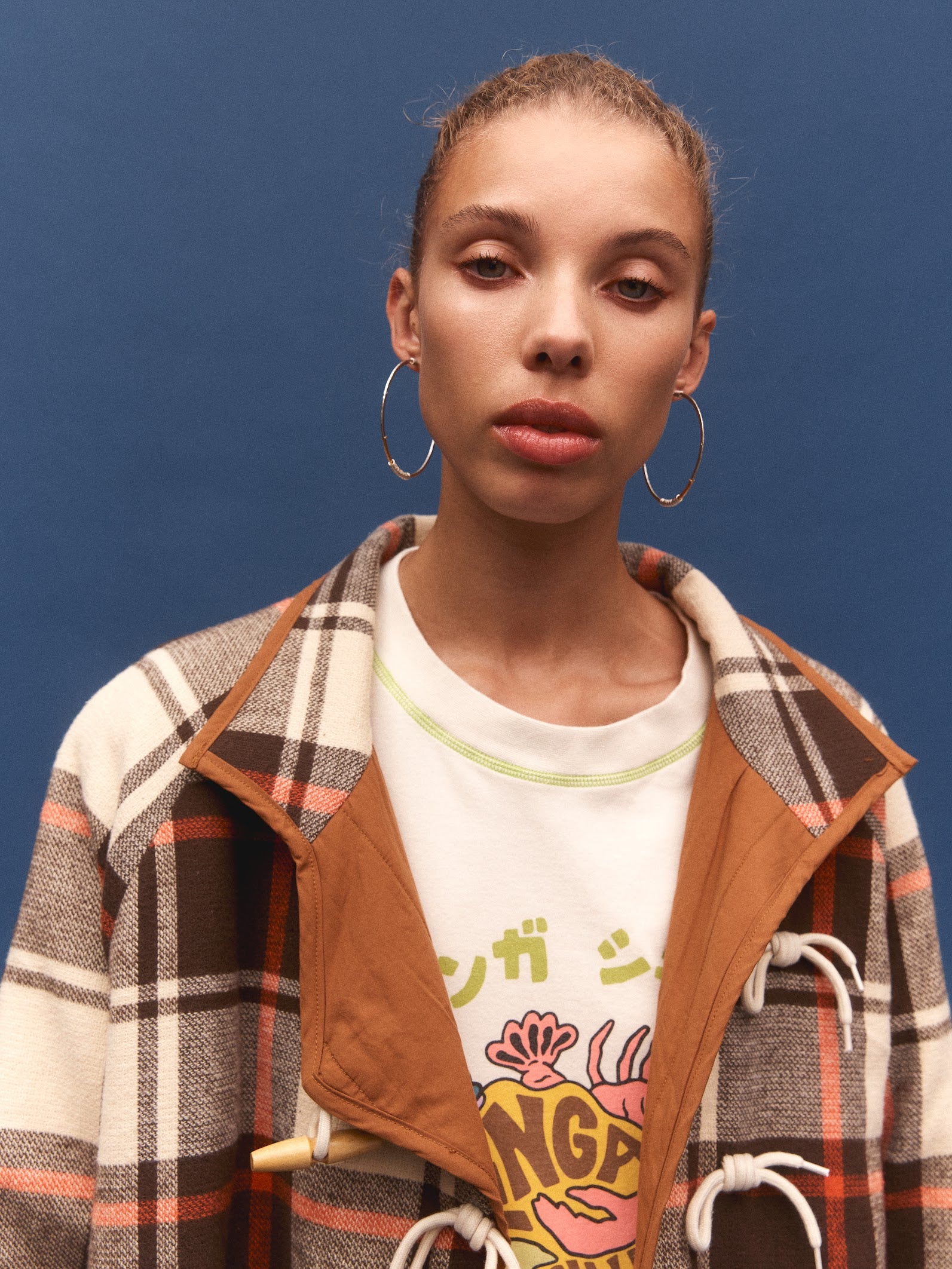 Kinga Csilla Rally Quilted Cocoon Jacket in tartan check — worn fastened, cocoon silhouette with dropped shoulders