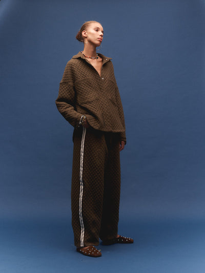 Kinga Csilla Sabbia Quilted Balloon Pant in dark brown — wide-leg diamond-quilted trousers with white side stripe and elasticated waistband